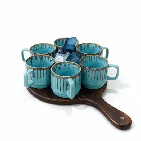 Elegant Diwali gift hamper with 6 sky-blue ceramic cups, wooden tray, and scented candle—perfect festive luxury for family and friends. Dailyalley