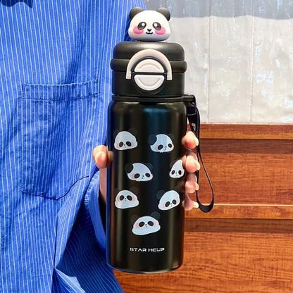 Black water bottle with panda designs held by a person wearing a blue shirt.
