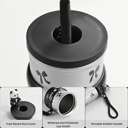 White cup with black lid and straw, featuring a panda design and text on a white background.