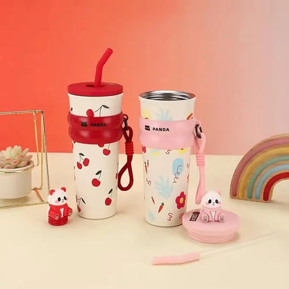 Two children's cups with panda design on a colorful background