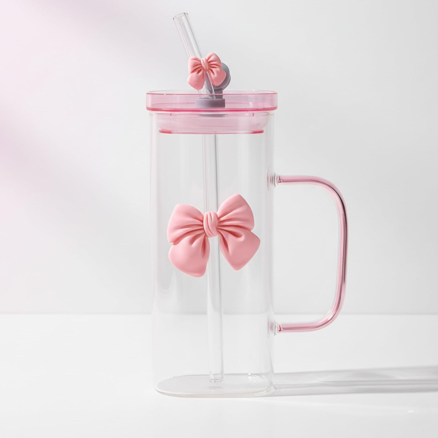 DailyAlley Cute Bow Tumbler - A stylish glass tumbler with a bow design and straw, perfect for enjoying your favorite drinks on the go. Dailyalley